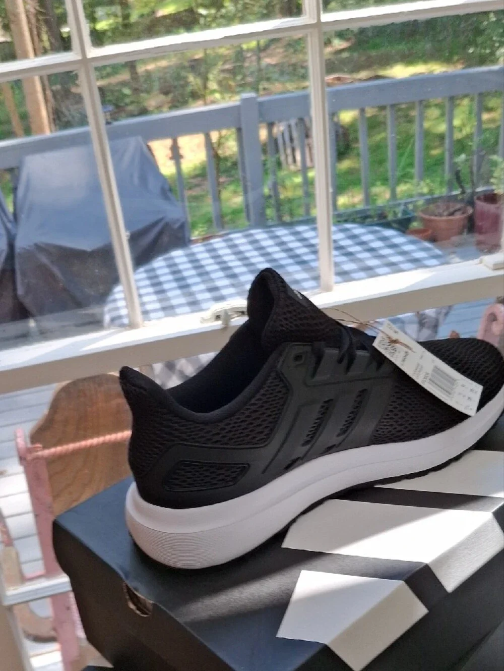 adidas Men's Black Athletic Running Shoe with White Midsole
